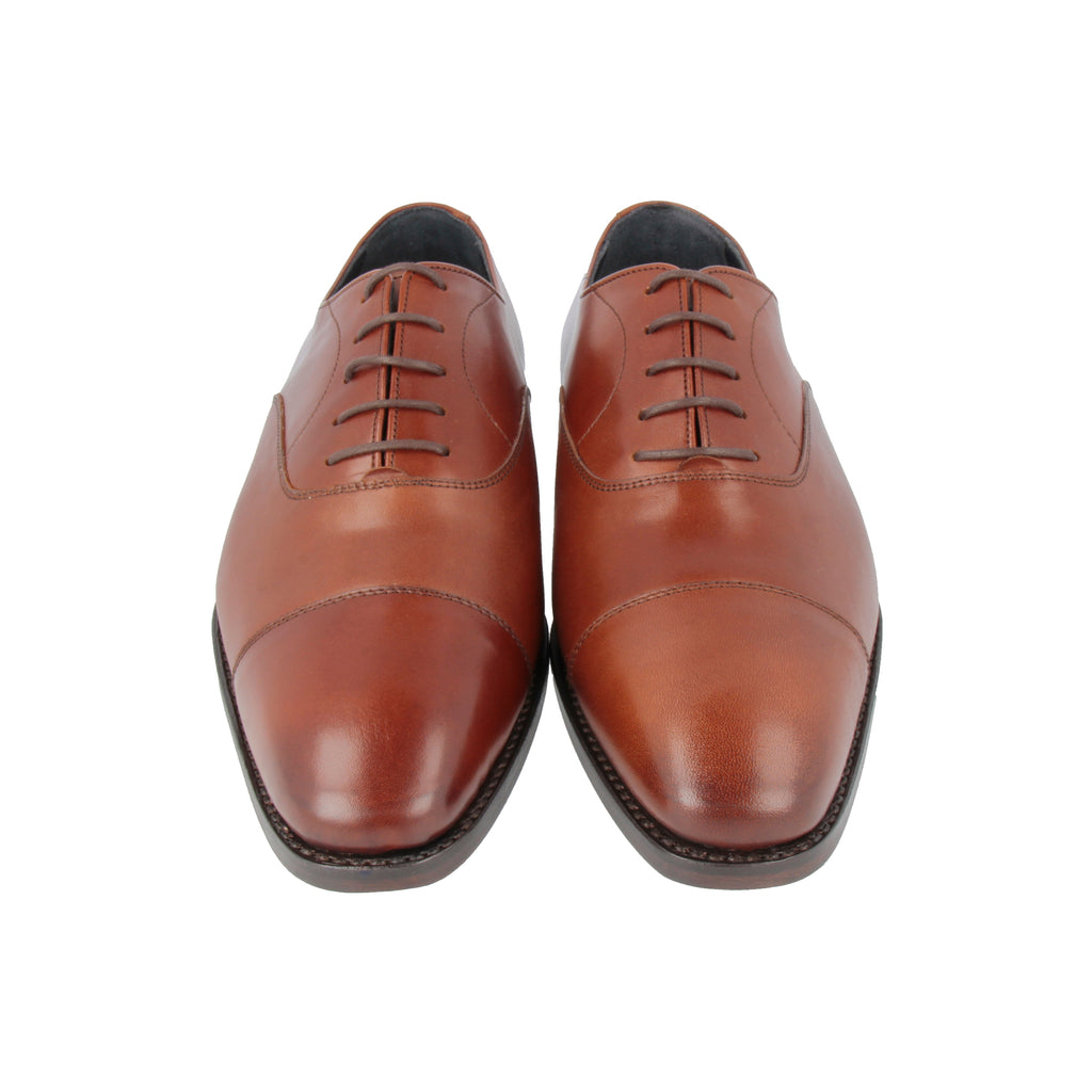 We introduce our signature captoe oxford in our C157 soft chisel  last.